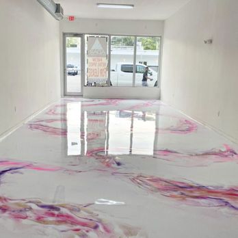 AP Epoxy Flooring - a white room with pink and purple paint on the floor - Flooring Near Me