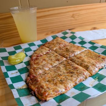 Novel Pizza Cafe - A "slice," with pineapple agua fresca - Pizza Near Me - Chicago, Illinois