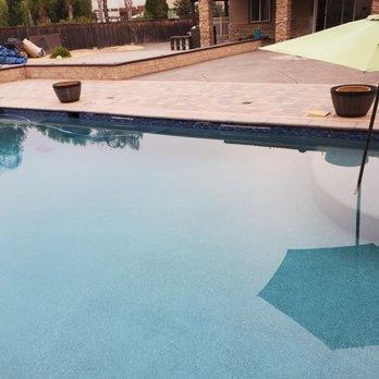 Tropical Breeze Custom Pools - Tile peeling from inside the pool. - Pool & Hot Tub Service Near Me Tropical Breeze Custom Pools - Tile peeling from inside the pool. - Pool & Hot Tub Service Near Me