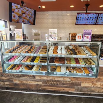 Randy's Donuts - 7/17/23 display case: fresh donuts in the morning but throughout the day as well. - Coffee & Tea Near Me - Las Vegas, Nevada Randy's Donuts - 7/17/23 display case: fresh donuts in the morning but throughout the day as well. - Coffee & Tea Near Me - Las Vegas, Nevada