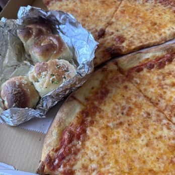 Rosa's Pizza - Plain slices and the best garlic knots - Pizza Near Me - Maspeth, New York