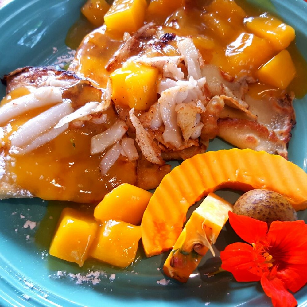 Pele's Kitchen - Papaya and coconut blintzs. The papaya and coconut were so ripe and fresh it was crazy. - Breakfast & Brunch Near Me - Pahoa, Hawaii Pele's Kitchen - Papaya and coconut blintzs. The papaya and coconut were so ripe and fresh it was crazy. - Breakfast & Brunch Near Me - Pahoa, Hawaii