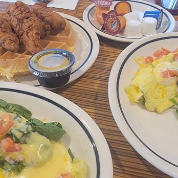 IHOP - Chicken waffles and spinach omelet split in half. - American Near Me - Killeen, Texas