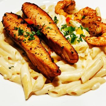 OCHA’s - Chef's pasta penne creamy Alfredo sauce with salmon and three wild jumbo shrimp - Caribbean Near Me - Vaughan, Ontario