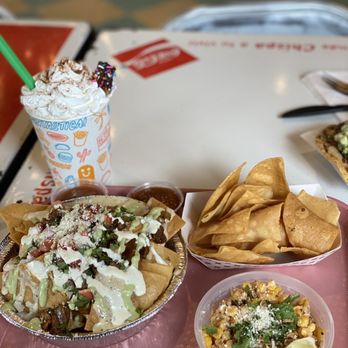 Invicto - a tray of nachos, chips, and a drink - Mexican Near Me - Naperville, Illinois Invicto - a tray of nachos, chips, and a drink - Mexican Near Me - Naperville, Illinois