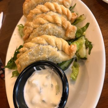 Kanoon - Sambousek 4 Pcs - Steakhouses Near Me - Fishers, Indiana Kanoon - Sambousek 4 Pcs - Steakhouses Near Me - Fishers, Indiana