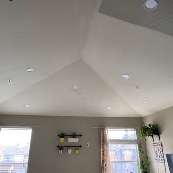 Akash Construction - a living room with ceiling lights - General Contractors Near Me - Fremont, California