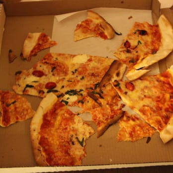 Cafe Fiorello - Having to tear apart an unsliced, delivered pizza. - Italian Near Me - New York, New York