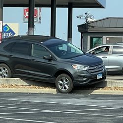 Sam's Club Fuel Center - This guys high centered by not following directions and the silver car behind him was not learning from this mistake.