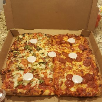 Bella Pizzeria - Two small Sicilian pizzas side by side. Yes, small. - Pizza Near Me - Noblesville, Indiana