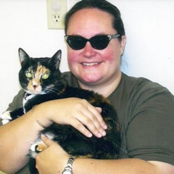 Towne Square Animal Clinic - This is Tofi and Tara (mentioned in Tara's review). Tofi has not let Tara pick her up since!