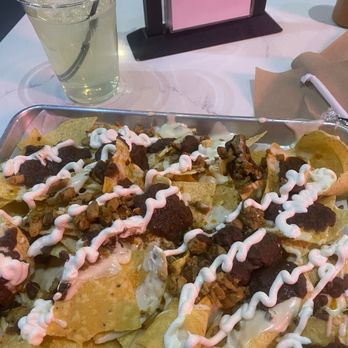 OMG Tacos - Loaded nachos with chicken and no pico. On the rocks margarita. - Asian Fusion Near Me - Richardson, Texas