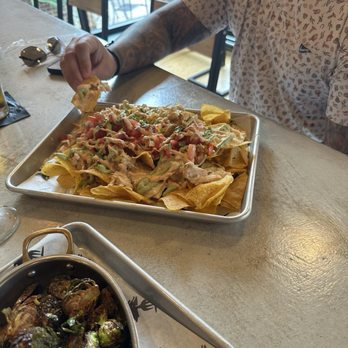 Twisted Pine - Chicken nachos, brussels sprouts - Bars Near Me - Winston-Salem, North Carolina Twisted Pine - Chicken nachos, brussels sprouts - Bars Near Me - Winston-Salem, North Carolina