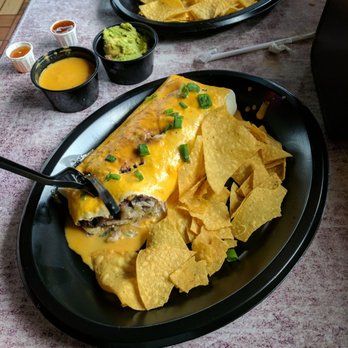 Tijuana Flats - Steak burrito "wet" with queso... So good - Mexican Near Me - Ft. Walton Beach, Florida Tijuana Flats - Steak burrito "wet" with queso... So good - Mexican Near Me - Ft. Walton Beach, Florida