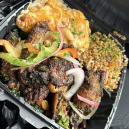 Jerk chicken rice, and peas and Mac Jerk chicken rice, and peas and Mac