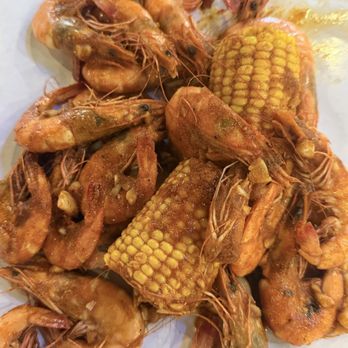 The Boiling Crab - Shrimp and corn with The Whole Sha-Bang!® (1 pound of shrimp with a mix of Rajun Cajun, Lemon Pepper and Garlic Butter seasonings) - Cajun/Creole Near Me - Burbank, California The Boiling Crab - Shrimp and corn with The Whole Sha-Bang!® (1 pound of shrimp with a mix of Rajun Cajun, Lemon Pepper and Garlic Butter seasonings) - Cajun/Creole Near Me - Burbank, California