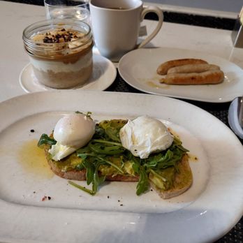 Soul at The Joseph - Avocado toast with overnight oats and chicken sausage in the background. - Breakfast & Brunch Near Me - Columbus, Ohio
