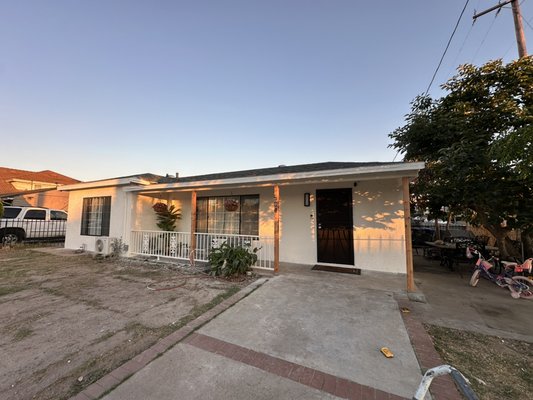 Exterior painting - Repainting of the house exterior with windows, replacement of three posts, and varnishing of the posts