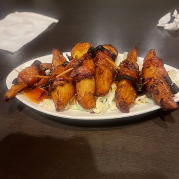 Riptides Raw Bar & Grill - Jamaican bacon wrapped plantains - Seafood Near Me - Ormond Beach, Florida Riptides Raw Bar & Grill - Jamaican bacon wrapped plantains - Seafood Near Me - Ormond Beach, Florida