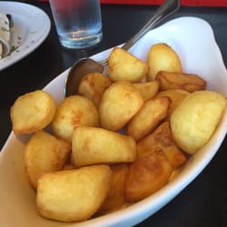 Finín's Restaurant & Bar - Side of potatoes with wrap