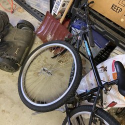 Tim's Bike Shop - Oh look no front tire
