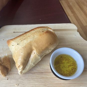 Frankie's International Bistro - This is a fresh hot bread with olive oil dipping - Breakfast & Brunch Near Me - Plainville, Massachusetts Frankie's International Bistro - This is a fresh hot bread with olive oil dipping - Breakfast & Brunch Near Me - Plainville, Massachusetts