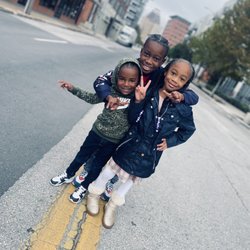 Mike's Downtown Garage - My kids outside the shop while we wait on our services to be done