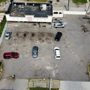 Armor Exterior Services - prepping asphalt parking lot to overlay new asphalt - Roofing Near Me - Warren, Michigan Armor Exterior Services - prepping asphalt parking lot to overlay new asphalt - Roofing Near Me - Warren, Michigan