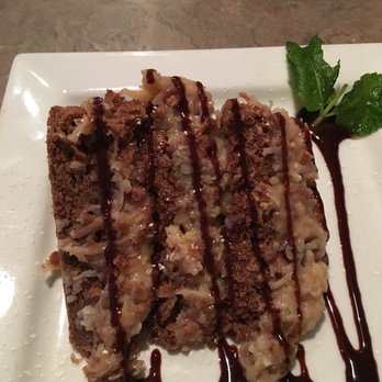 Four Roses Cafe - German chocolate cake - New American Near Me - Plainwell, Michigan Four Roses Cafe - German chocolate cake - New American Near Me - Plainwell, Michigan