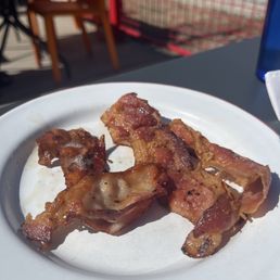 Crispy hot bacon of the grill