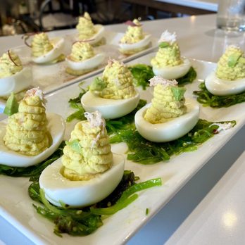The Hammond Kitchen + Craft Bar - California Deviled Eggs with Crab, Avocado, Ginger, and Wasabi on Seaweed Salad - Tapas/Small Plates Near Me - Camas, Washington The Hammond Kitchen + Craft Bar - California Deviled Eggs with Crab, Avocado, Ginger, and Wasabi on Seaweed Salad - Tapas/Small Plates Near Me - Camas, Washington