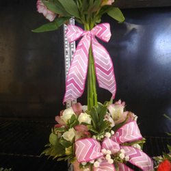 Floral Expressions and Gifts - Topiary style arrangement that's sure to make someone special smile.