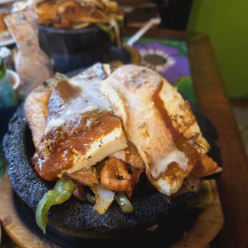 Aguacates Mexican Bar and Grill - Molcajete with chicken,fish, shrimp, steak, and cactus - Mexican Near Me - Buffalo, New York Aguacates Mexican Bar and Grill - Molcajete with chicken,fish, shrimp, steak, and cactus - Mexican Near Me - Buffalo, New York
