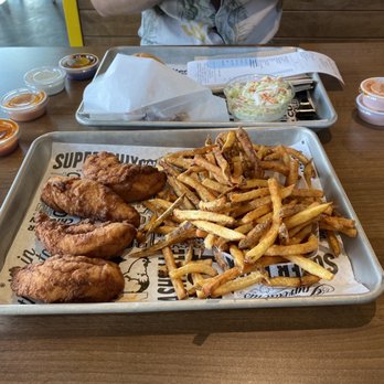 Super Chix - 4 piece chicken tender and the smaller size fry (still huge) and an assortment of sauces - Chicken Shop Near Me - American Fork, Utah Super Chix - 4 piece chicken tender and the smaller size fry (still huge) and an assortment of sauces - Chicken Shop Near Me - American Fork, Utah