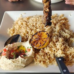 Beef kabob skewer ... comes with beef,  rice, hummus,  and a pita