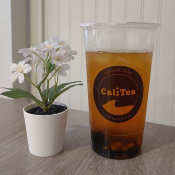 CaliTea - San Diego - Tropic Osmanthus with boba pearls - Bubble Tea Near Me - San Diego, California CaliTea - San Diego - Tropic Osmanthus with boba pearls - Bubble Tea Near Me - San Diego, California