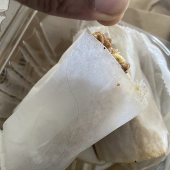 Toasted Bagelry & Deli - This is only one half of the strand of hair.. other half was in the other half of the wrap - Bagels Near Me - Miami, Florida