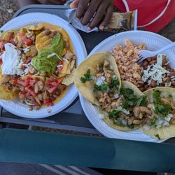 Nachos with meat. Chicken tacos with beans and rice.