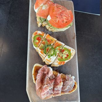 The Belmont - Pesto, Mozzarella, and tomato bruschetta. Cream cheese, pepper jam, and fresh chiles bruschetta. Fig jam and prosciutto bruschetta - Bars Near Me - Wichita, Kansas