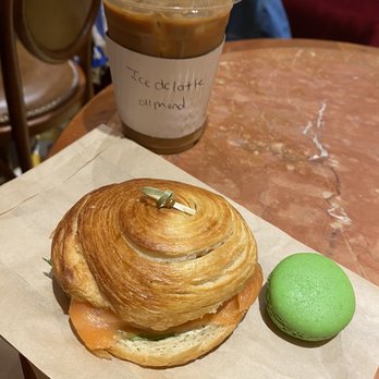 Cafe Bilboquet - Bun Feuillet, macaron pistachio, Iced Latte - Cafes Near Me - New York, New York