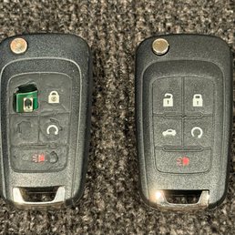 Old broken key fob and new key fob