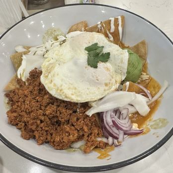 Helic International Bistro - Chilaquiles with chorizo added - Italian Near Me - Sacramento, California Helic International Bistro - Chilaquiles with chorizo added - Italian Near Me - Sacramento, California