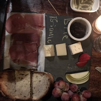 DiWine - Cheese plate (3 for $25) and the prosciutto from the Charcuterie board ($7). Plus butter of course (which was dangerously good) - Wine Bars Near Me - Astoria, New York