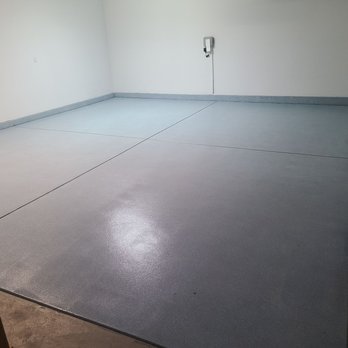 Brady Seal - an empty room with a door open - Grout Services Near Me