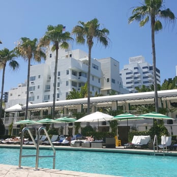 Kimpton Surfcomber Hotel - Waterfall pool, rooftop cabanas, plush cushion couch seating, umbrellas, amaze drinks= fab sobe location! - Hotels Near Me - Miami Beach, Florida
