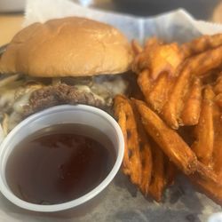 1st Street Lounge - Mushroom Swiss burger with sweet potato fries. It's served with honey that you don't really need it though. Enjoy the beefy burger.