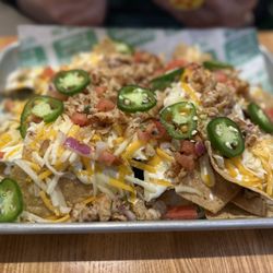 Quaker Steak & Lube - Nachos bell grande, with strange runny white cheese.