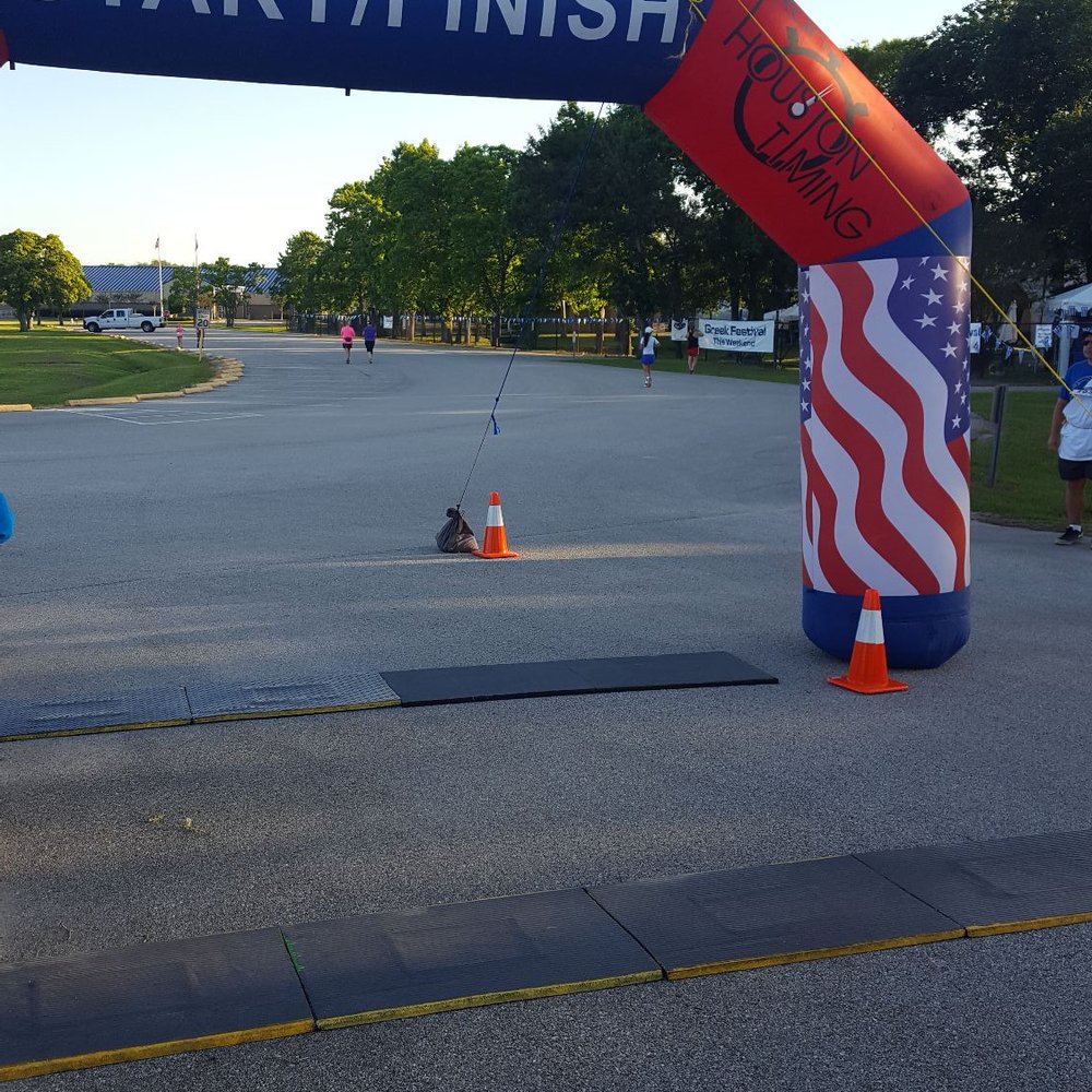 Toga Fun Run - Start/Finish line at Clear Lake Park, with Greek Festival set up in the distance. - Festivals Near Me - Seabrook, Texas Toga Fun Run - Start/Finish line at Clear Lake Park, with Greek Festival set up in the distance. - Festivals Near Me - Seabrook, Texas