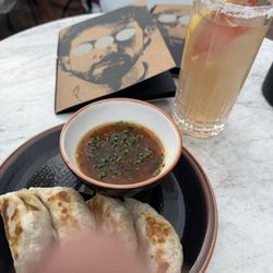 OOO Rooftop - Smoky Paloma and pork gyoza