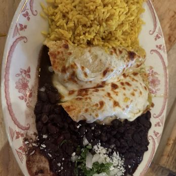Rocco's Tacos & Tequila Bar - Chicken Enchilada with black beans and rice - Mexican Near Me - West Palm Beach, Florida Rocco's Tacos & Tequila Bar - Chicken Enchilada with black beans and rice - Mexican Near Me - West Palm Beach, Florida